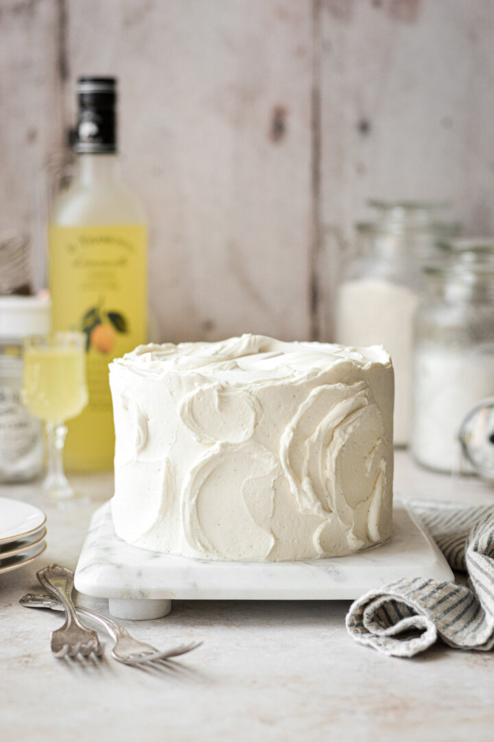Limoncello cream cake on a marble board.
