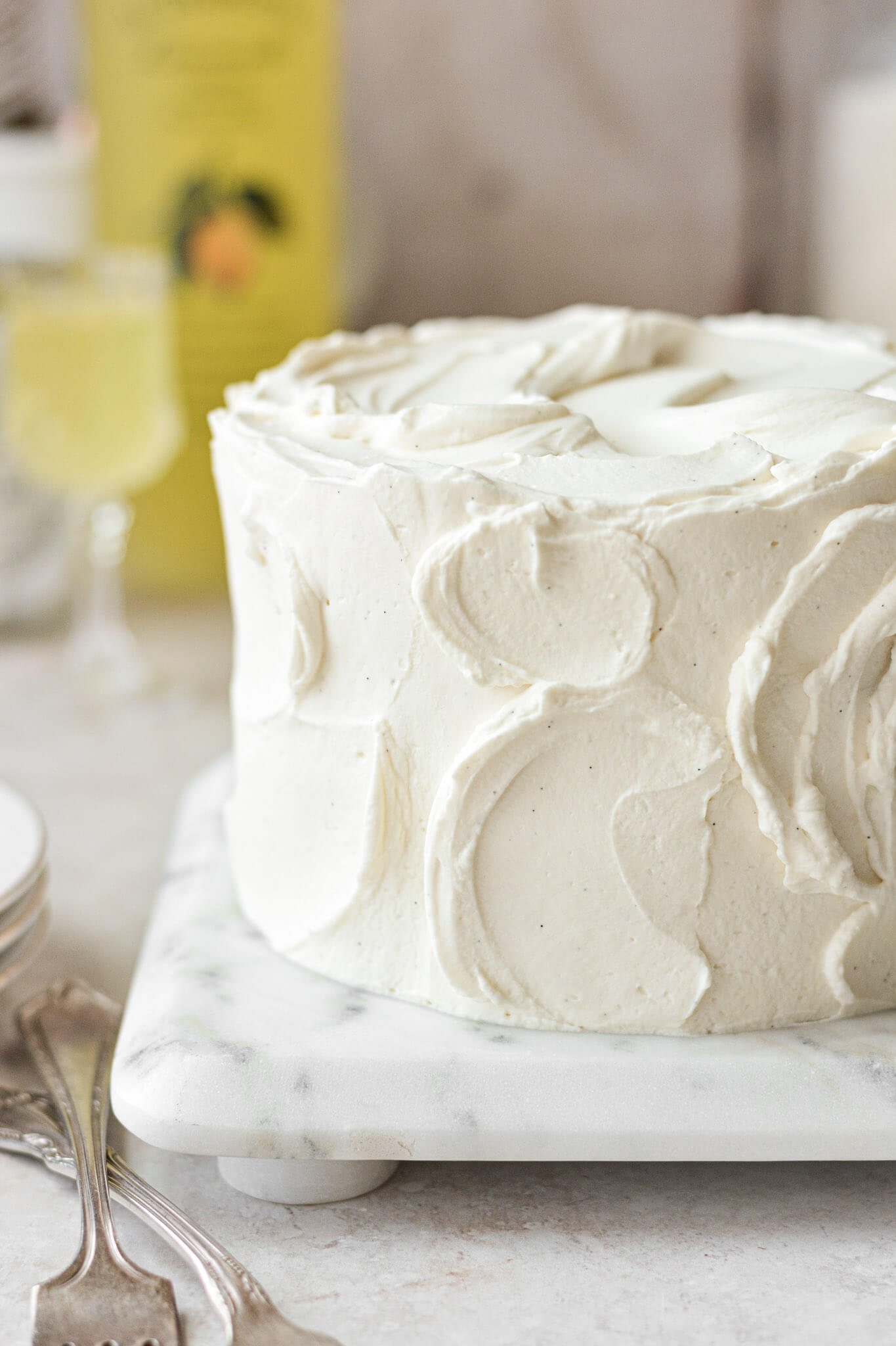 Limoncello cake with whipped cream frosting.
