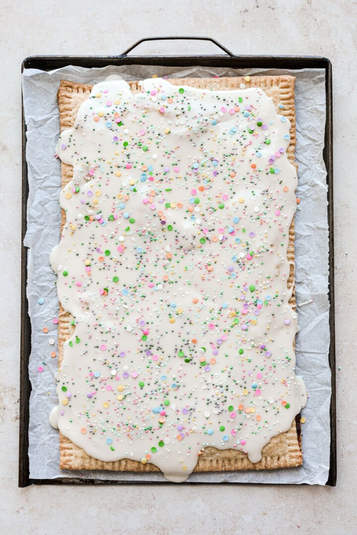 Step 13 for making a giant funfetti blueberry pop tart.