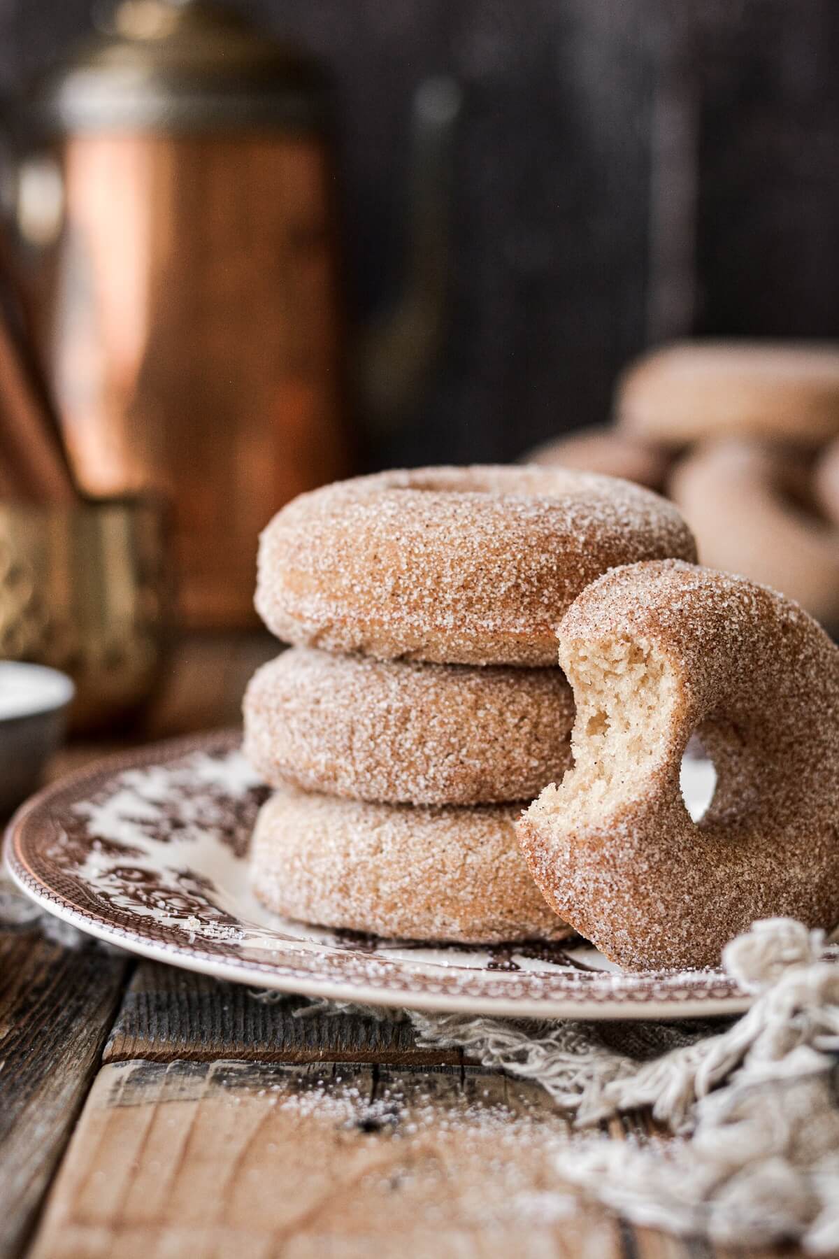 A plate of cinnamon sugar donuts.
