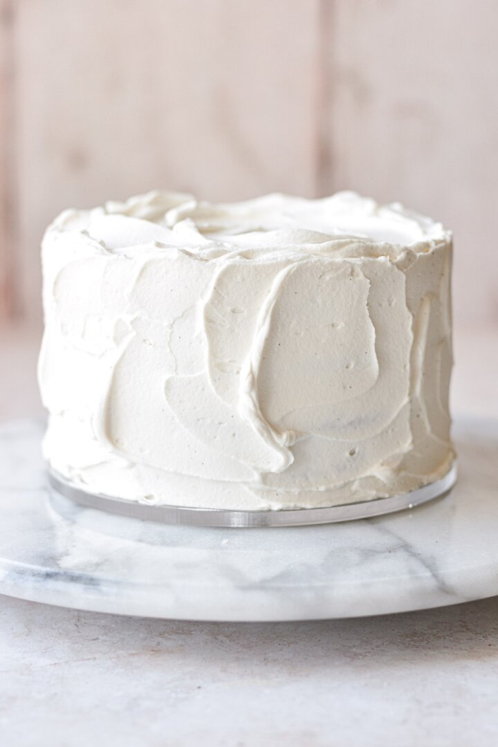 Whipped cream frosting on a cake.