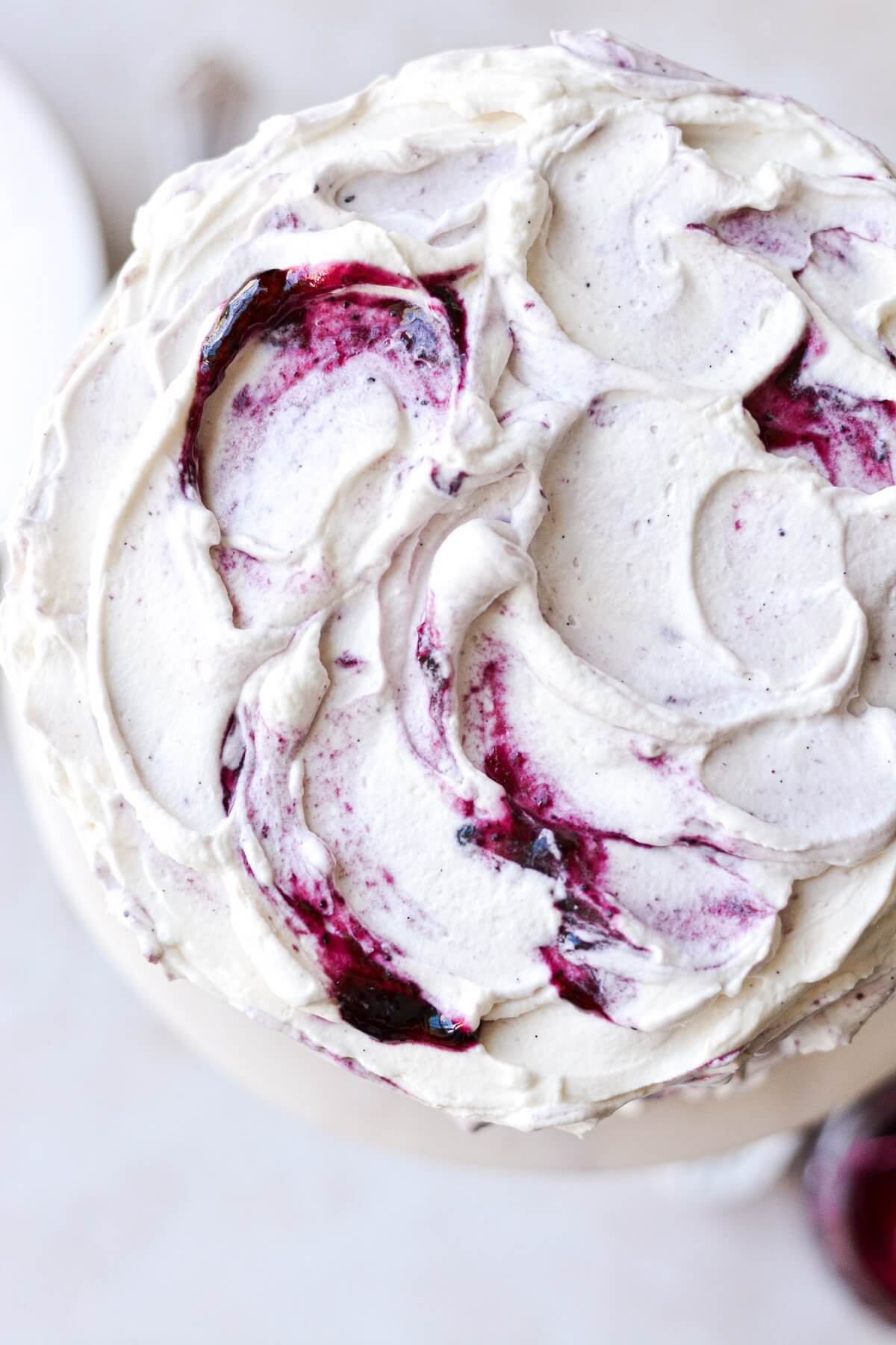 Blueberry jam swirled into whipped cream frosting.