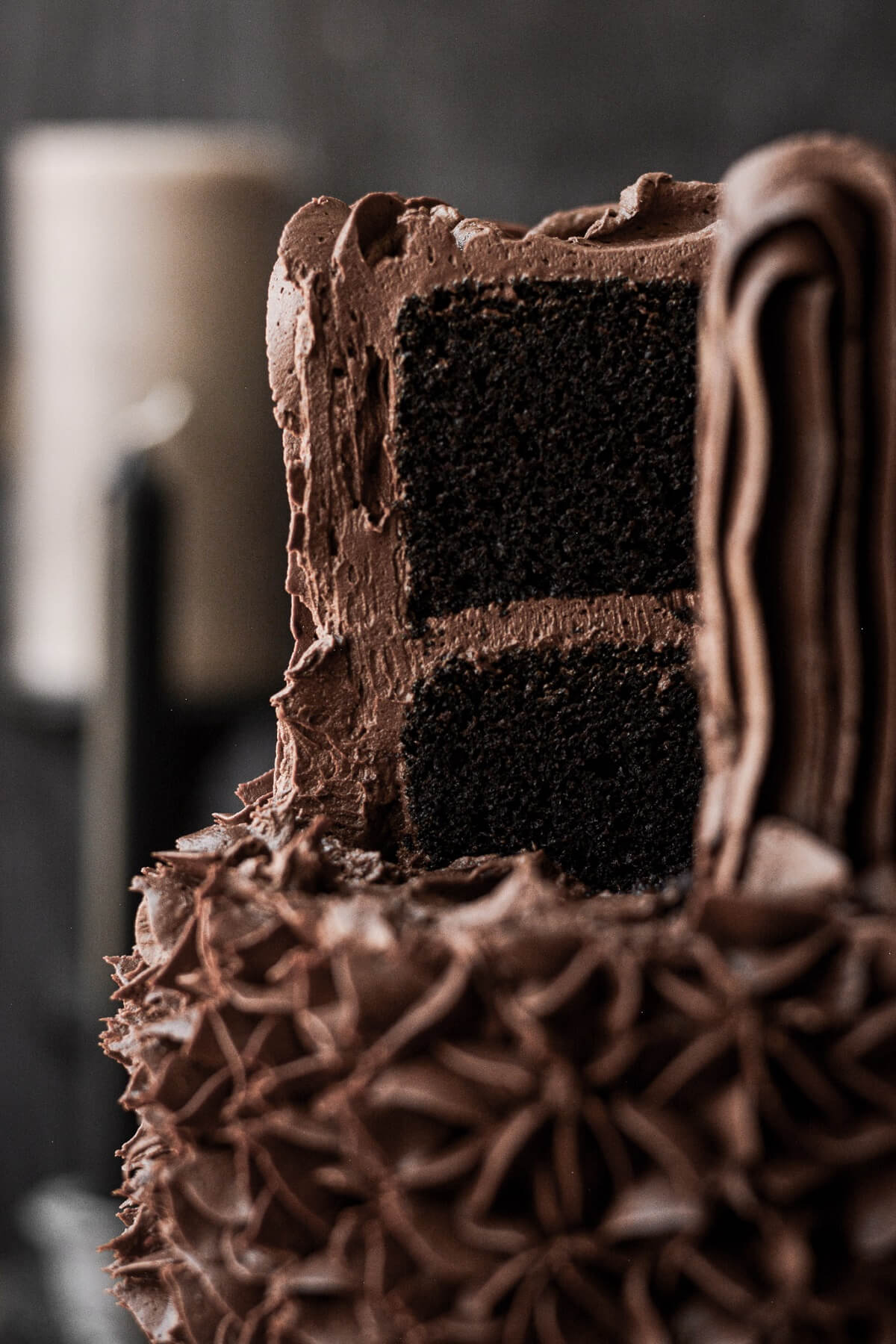 Double chocolate cake with a slice cut.