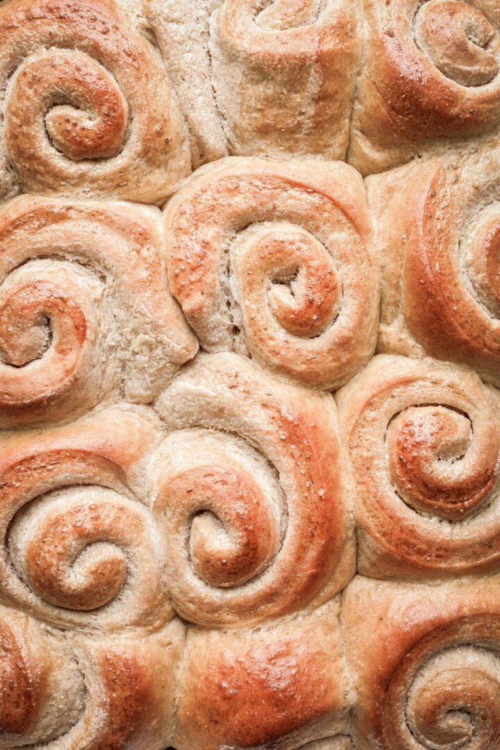 Spiral shaped cinnamon honey dinner rolls.
