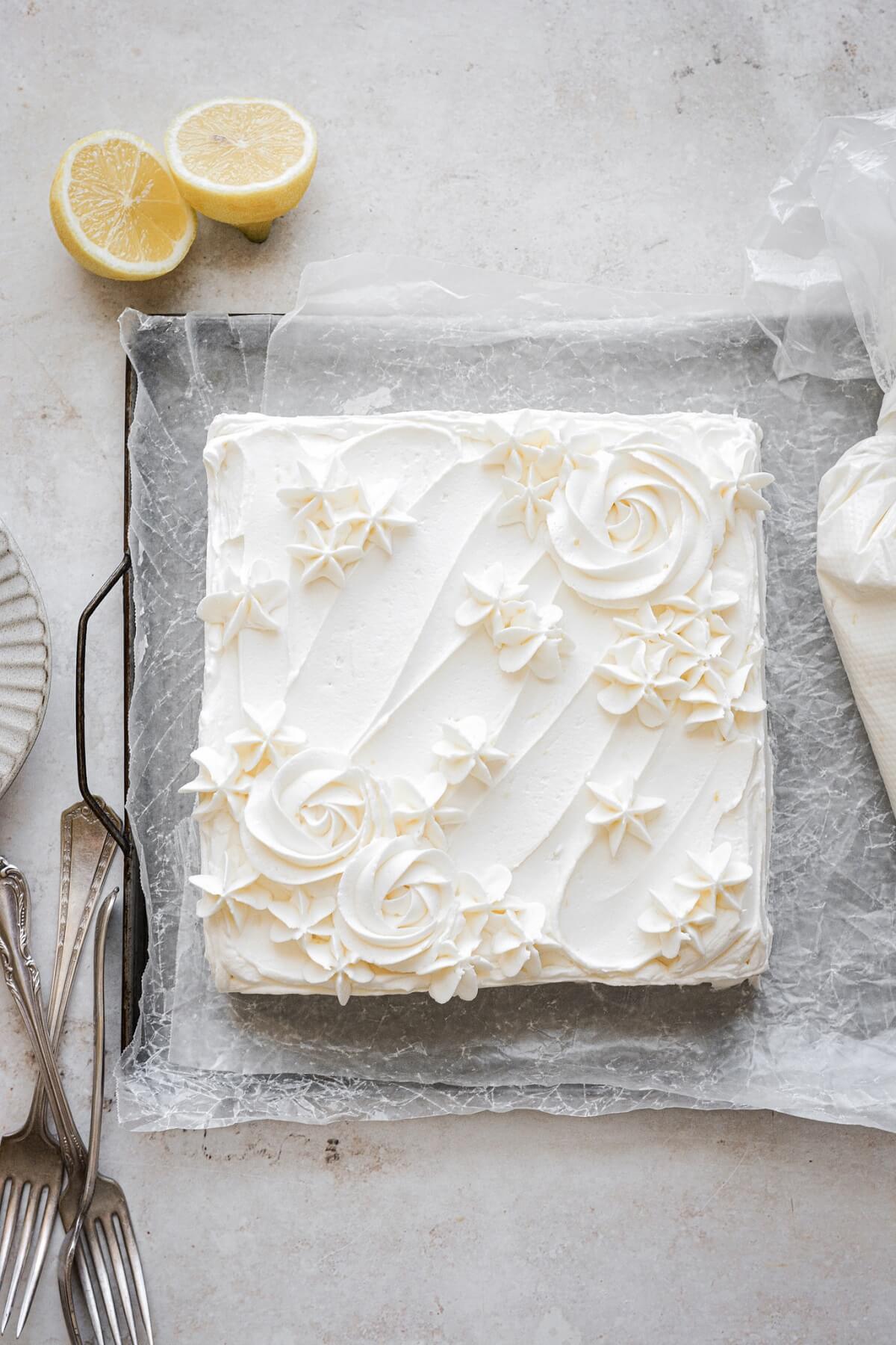 Lemon sheet cake with floral piped buttercream.