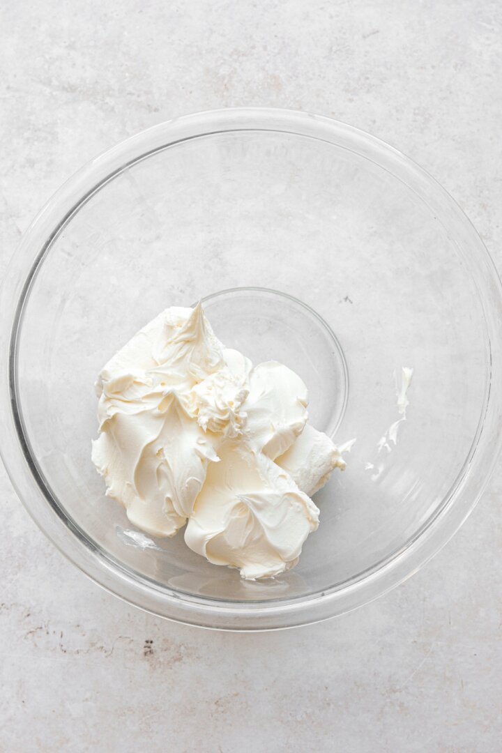 Step 1 for making mascarpone whipped cream filling.