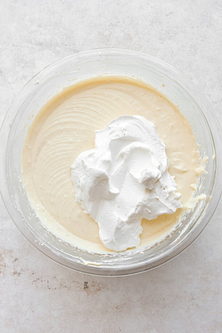 Step 5 for making mascarpone whipped cream filling.