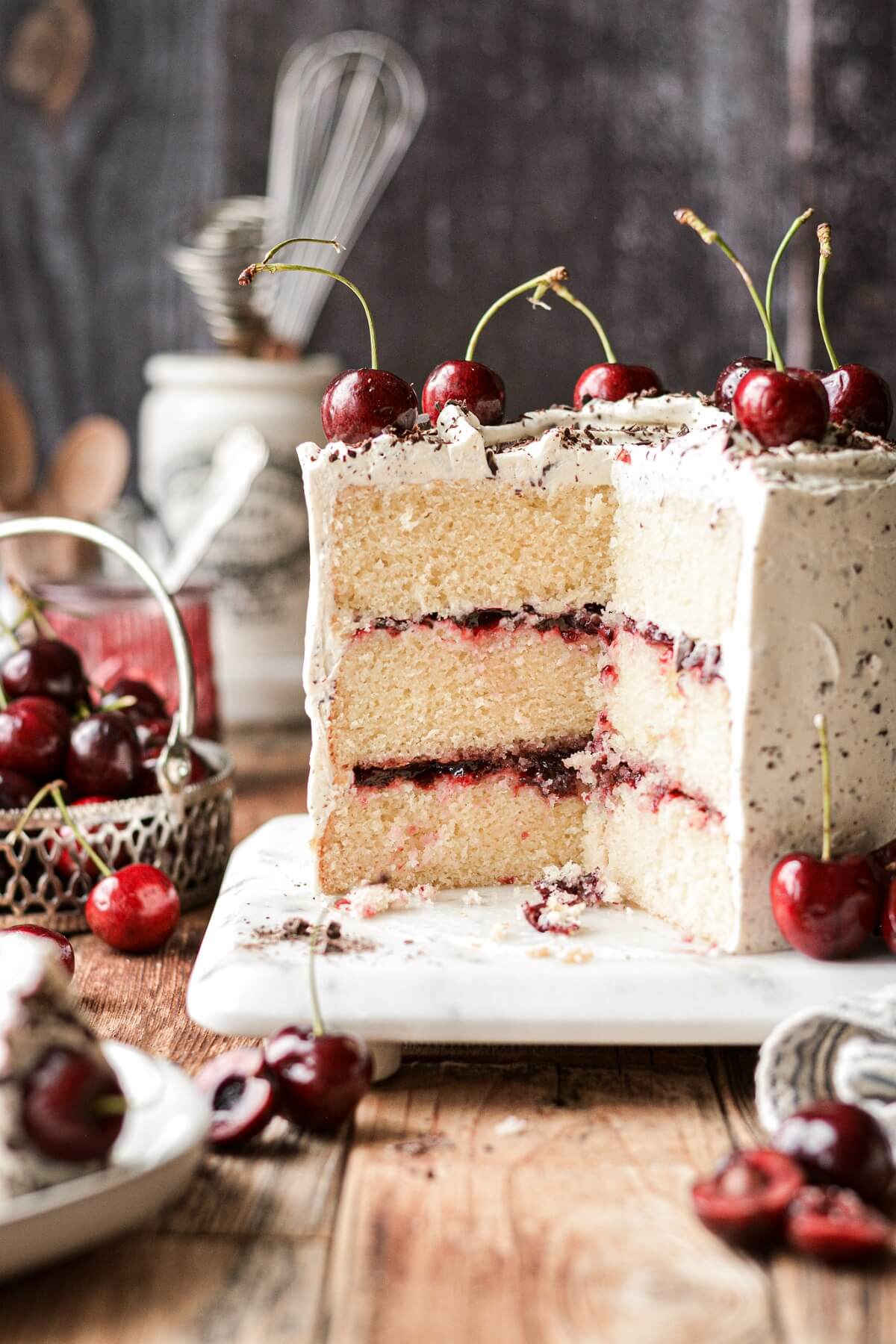 White forest cake filled with cherry jam.