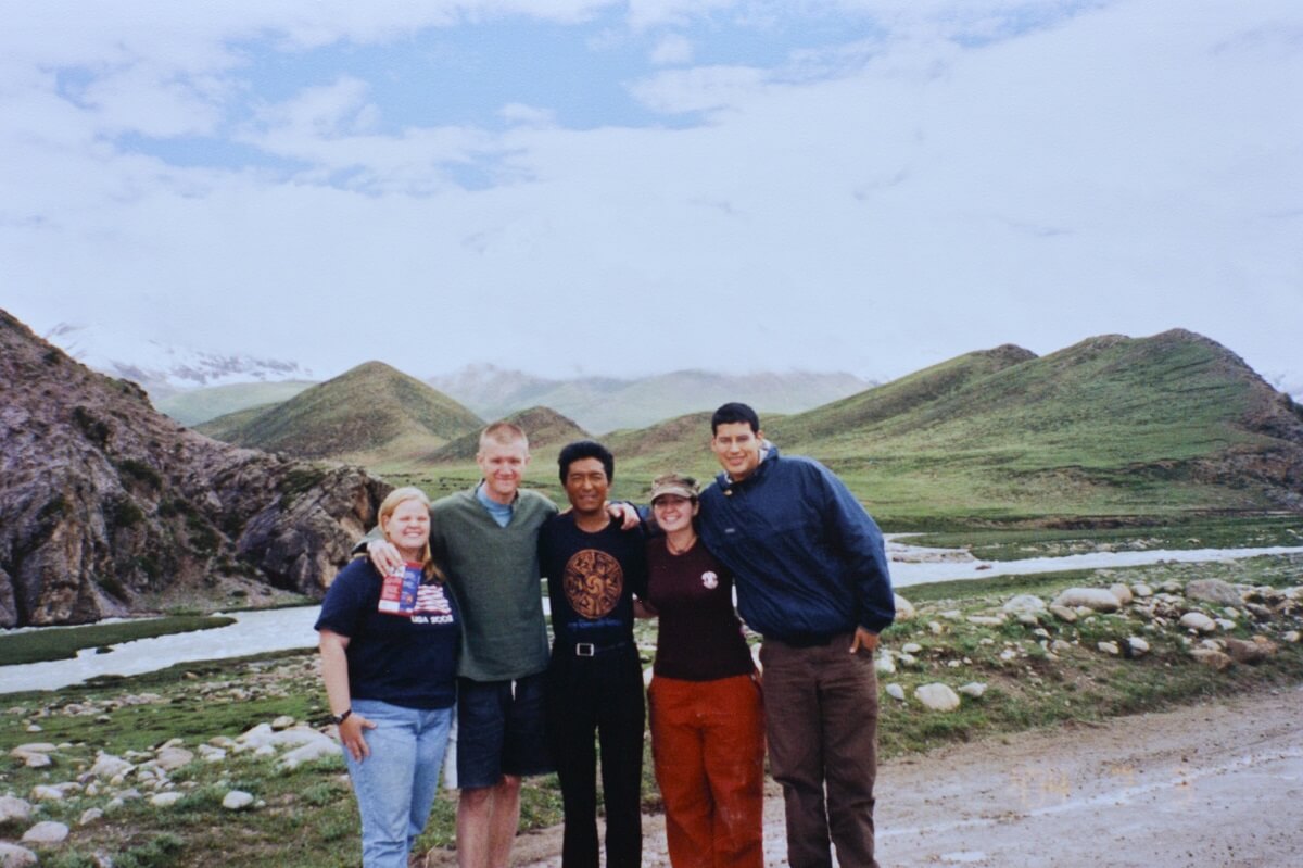 Group of friends on a road in Tibet.