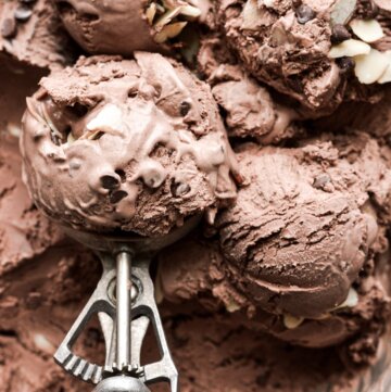 Scoops of chocolate almond amaretto ice cream.