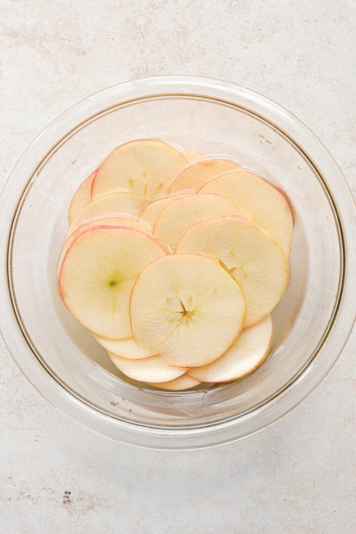 Step 2 for making dried apple slices.