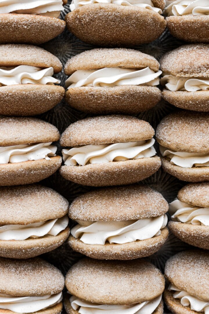 Snickerdoodle whoopie pies filled with vanilla buttercream.