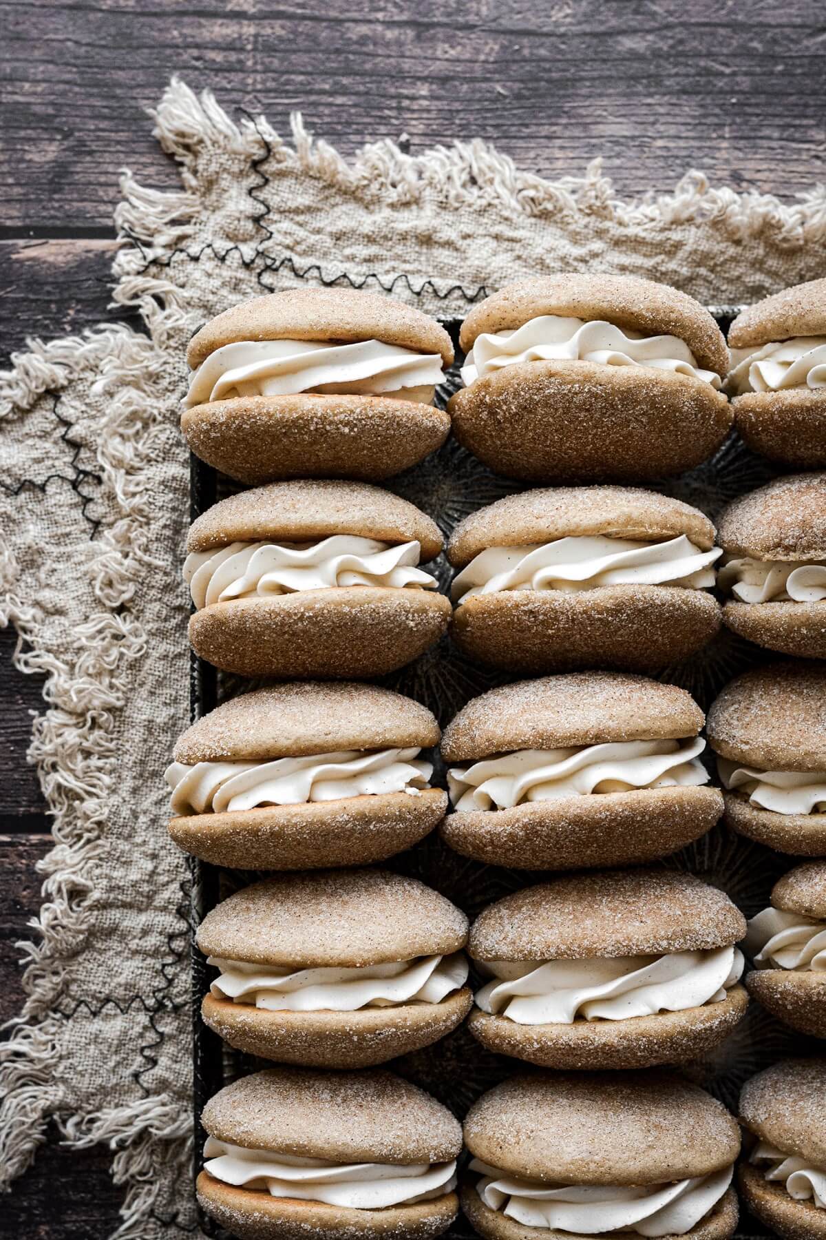 Snickerdoodle whoopie pies with a linen napkin.