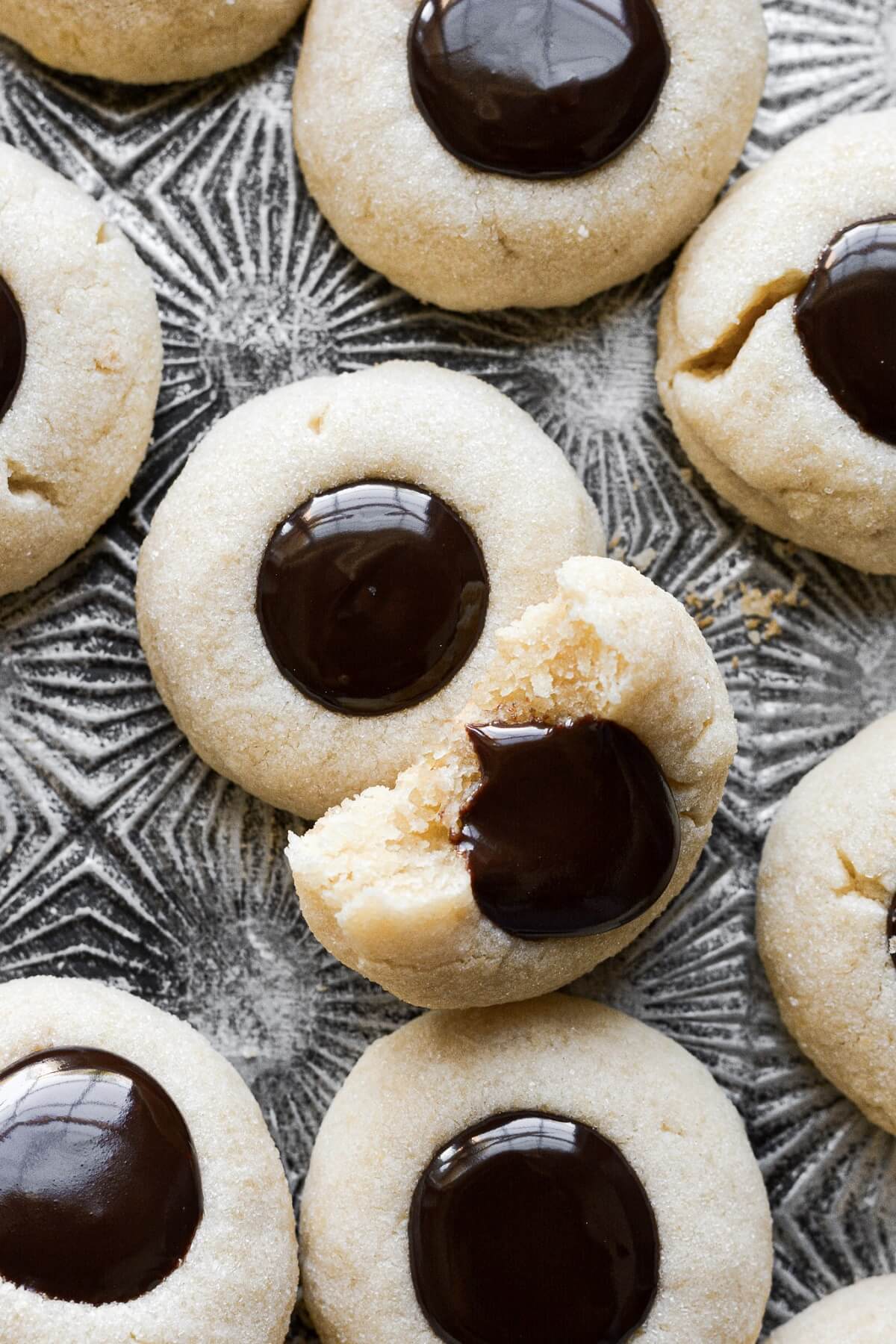 Chocolate thumbprint cookies filled with ganache.