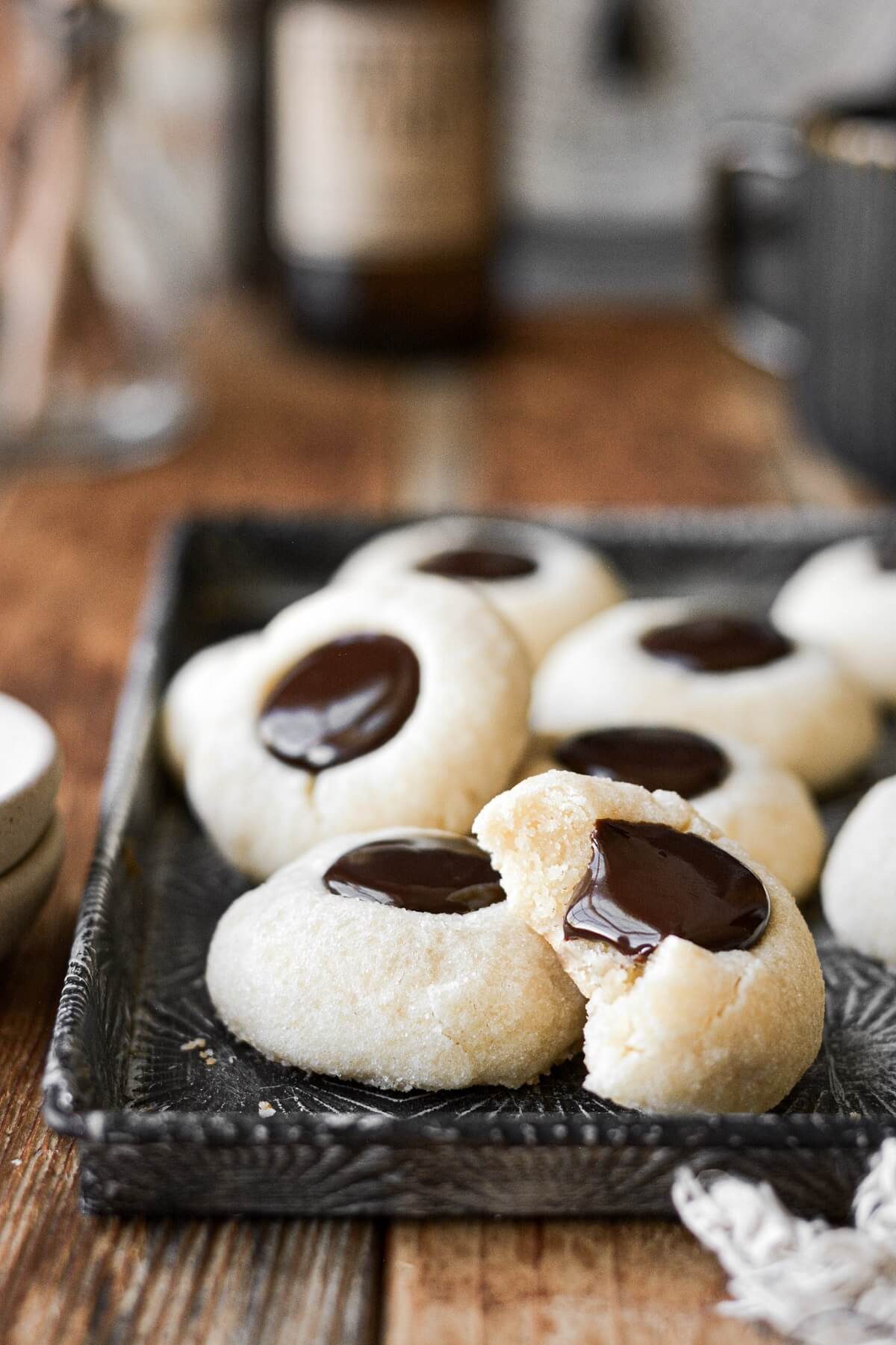 Chocolate thumbprint sugar cookies filled with ganache.