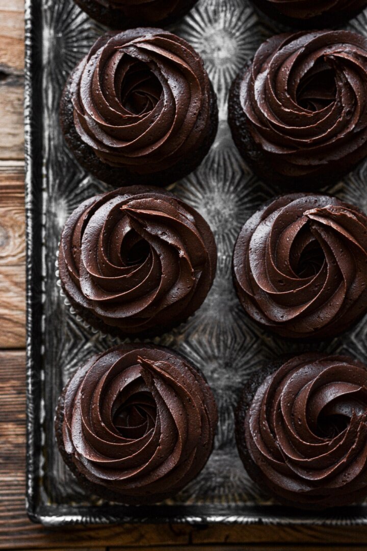 Chocolate cupcakes with swirls of chocolate buttercream.