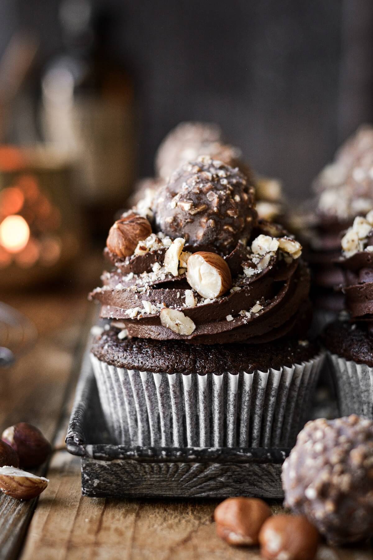 Chocolate hazelnut cupcakes with chocolate buttercream, chopped hazelnuts and Ferrero Rocher.