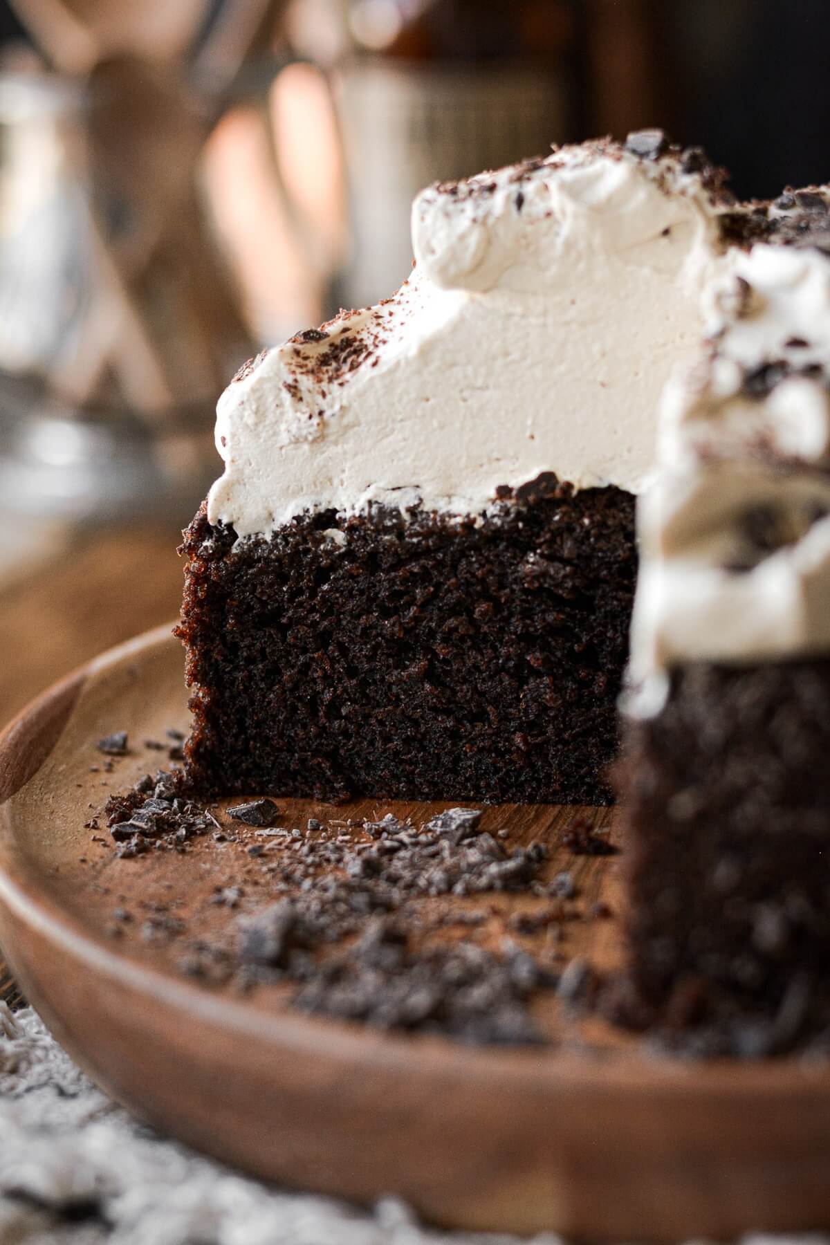 Chocolate mocha cream cake with a slice cut.