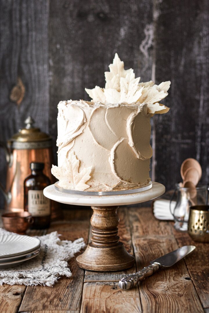 White chocolate maple spice cake with white chocolate leaves.