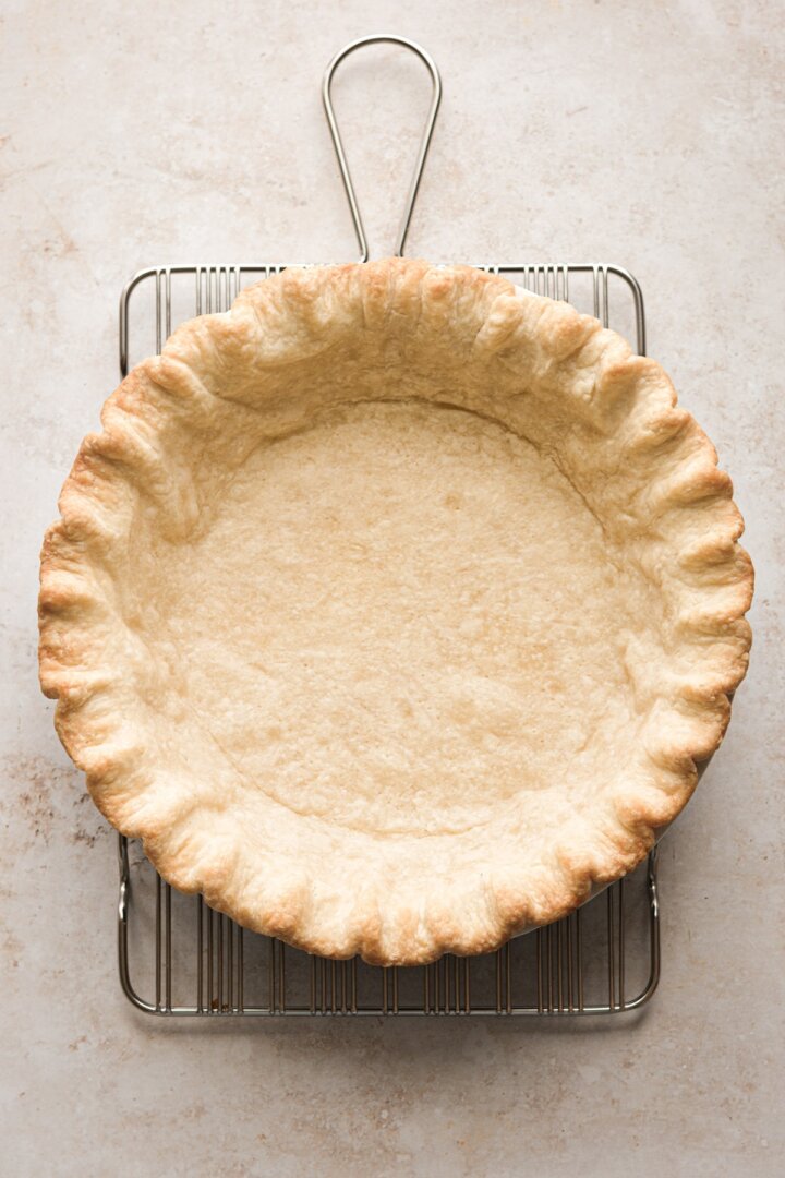 Step 3 for blind baking a pie crust.