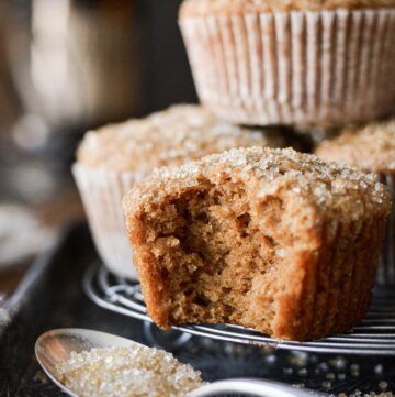 Gingerbread muffin with a bite taken.