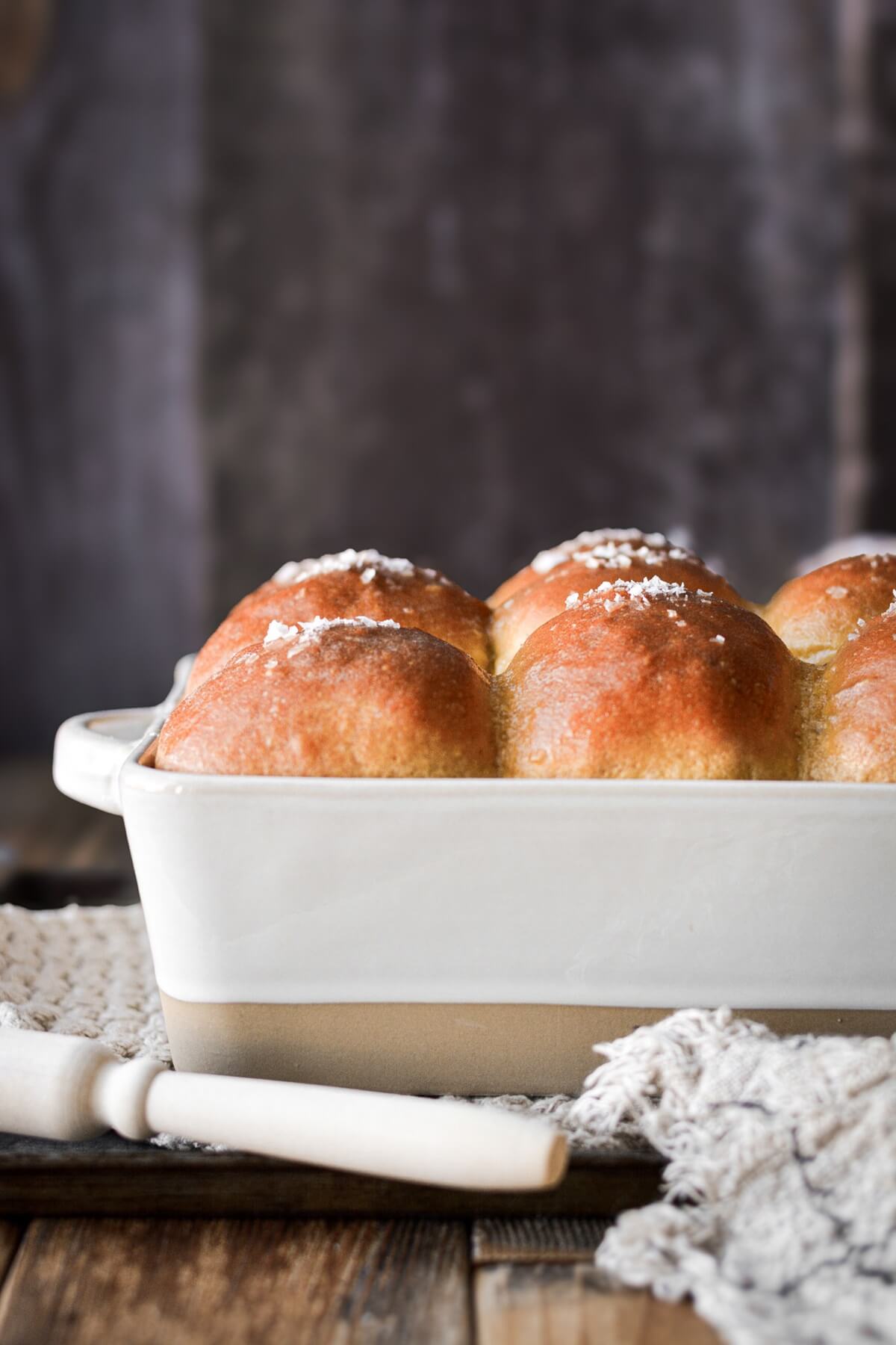 Homemade rolls in a baking dish.