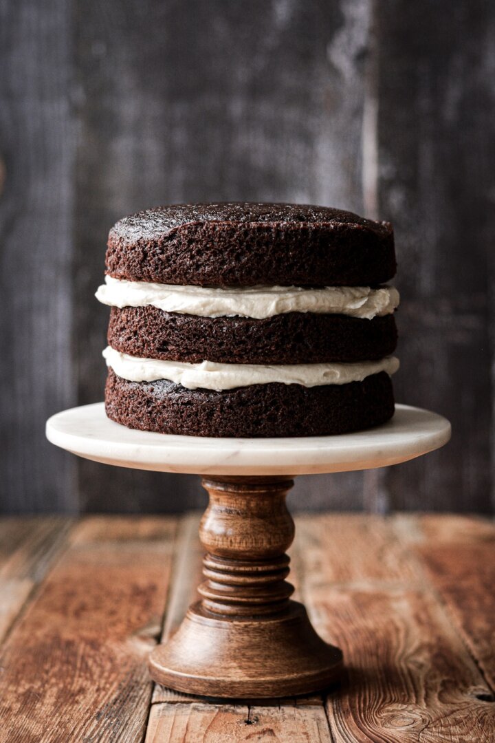 Chocolate cake layers filled with coconut buttercream.