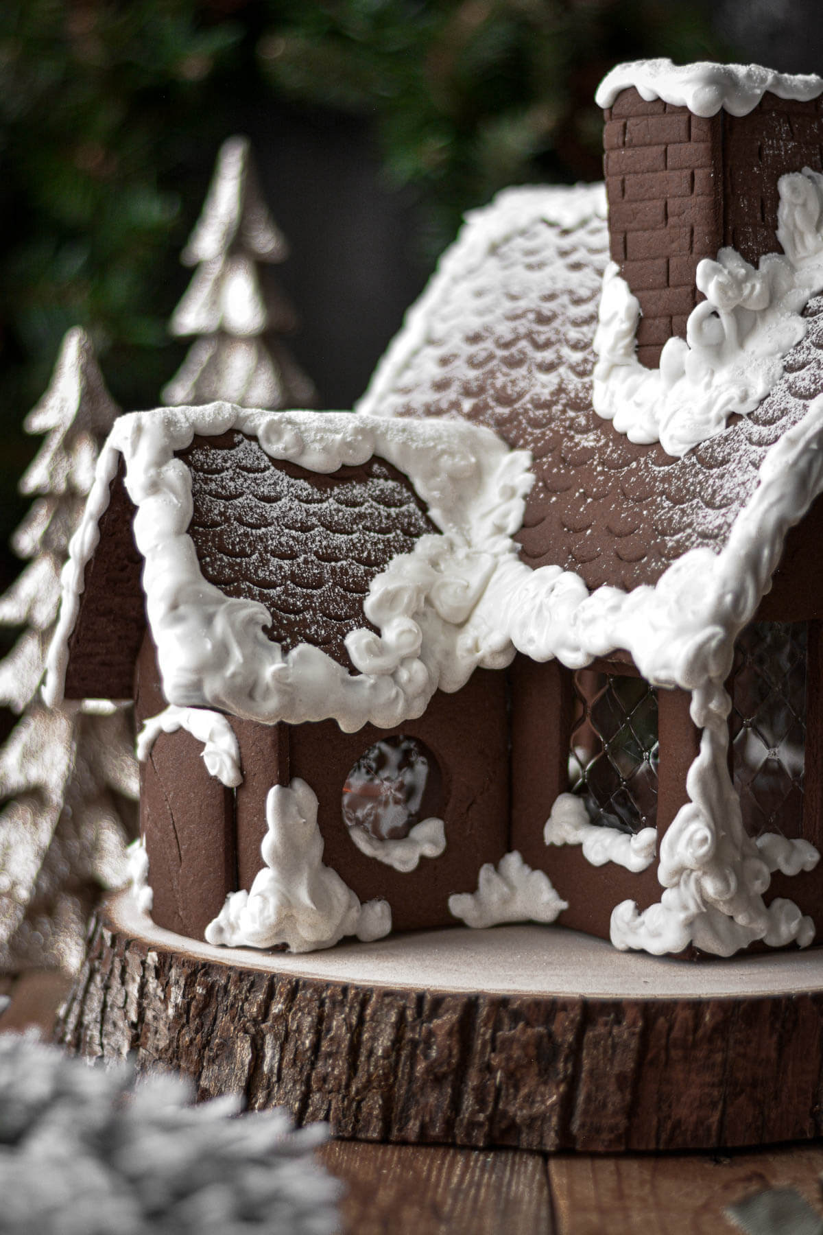 Royal icing snow on a gingerbread house.