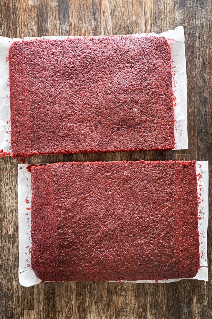 Red velvet sheet cake cut in half.