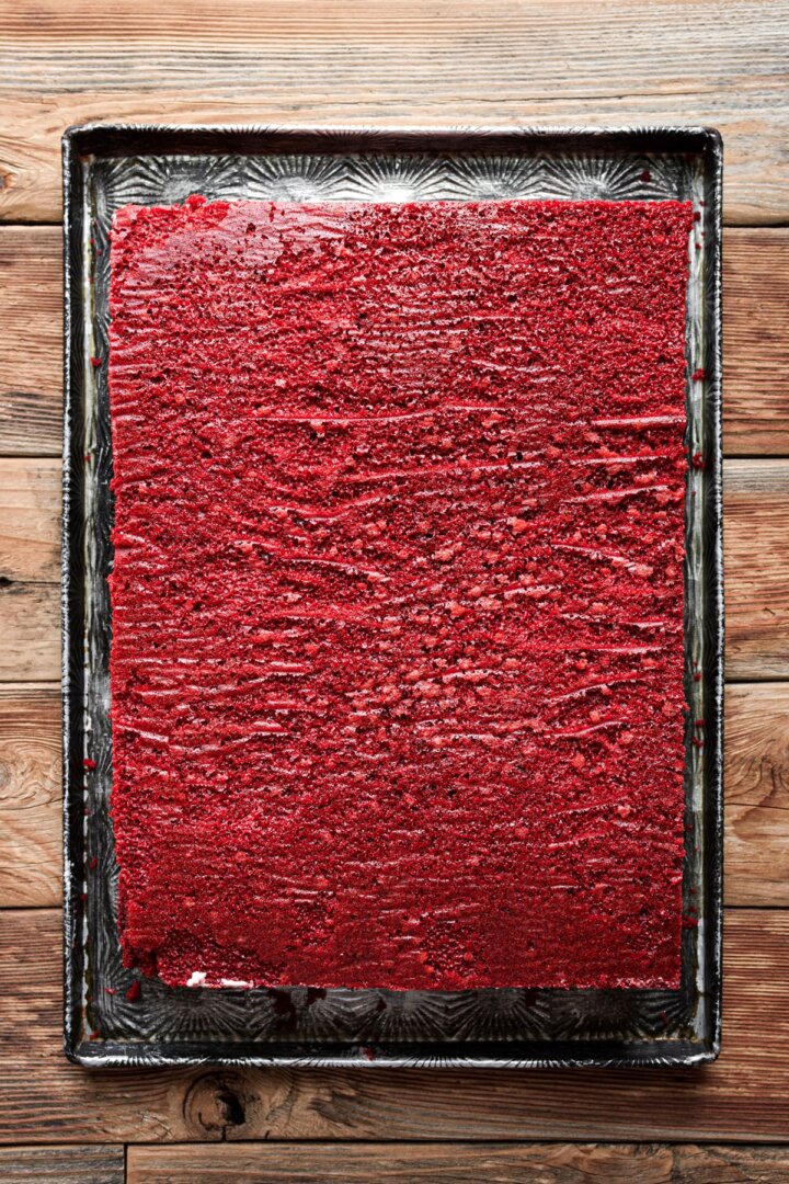 Step 3 for assembling a red velvet sheet cake.