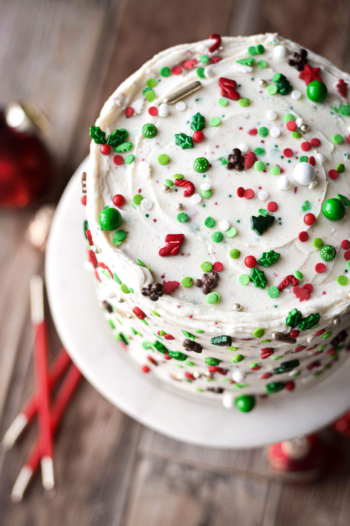 Christmas sprinkles covering a layer cake.