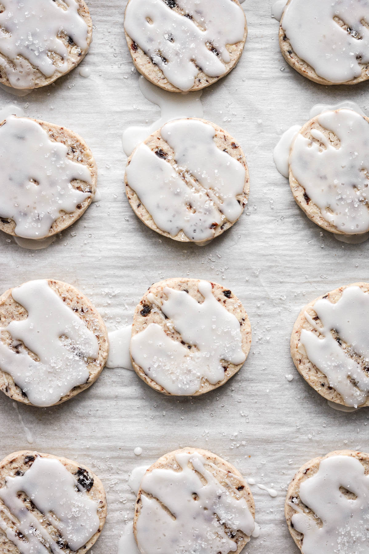 Cherry almond shortbread cookies with vanilla almond icing.