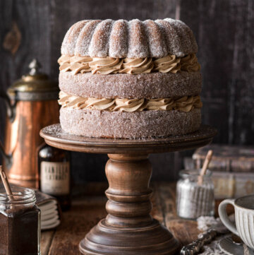 Coffee layer cake coated in espresso sugar and filled with swirls of coffee buttercream.