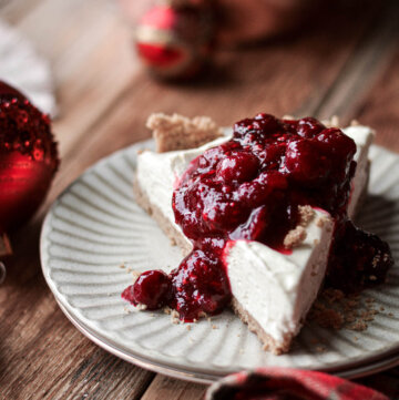 A slice of cranberry cream cheese pie on a plate.