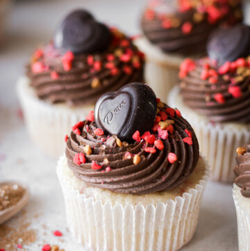 Chocolate hearts and valentines sprinkles on strawberry chocolate cupcakes.
