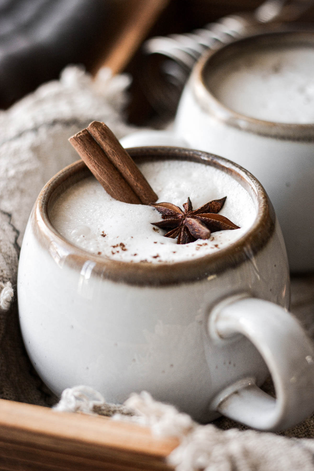 Coconut chai tea latte in a coffee cup.
