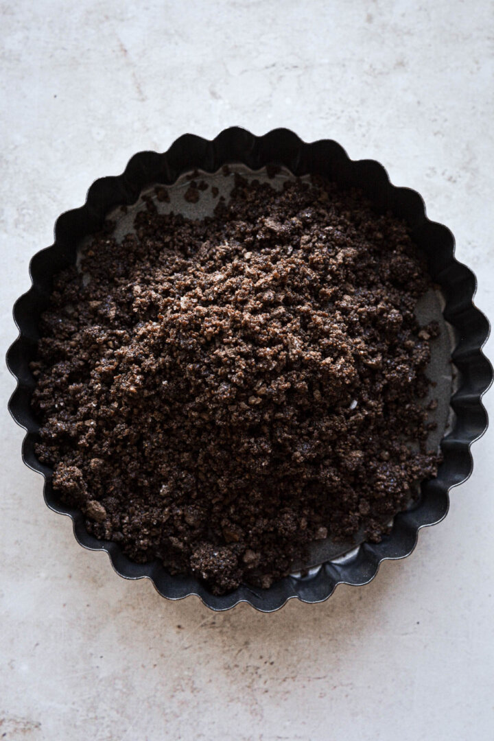 Step 1 for making a mini chocolate ganache tart.