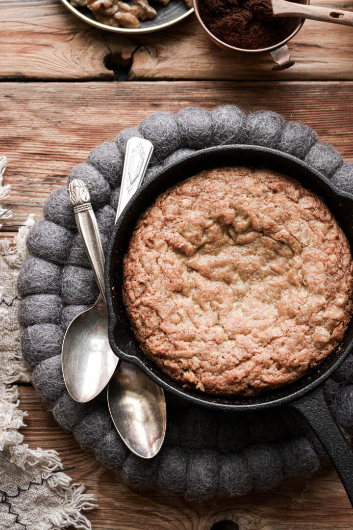 Oatmeal walnut cookie baked in a mini skillet.