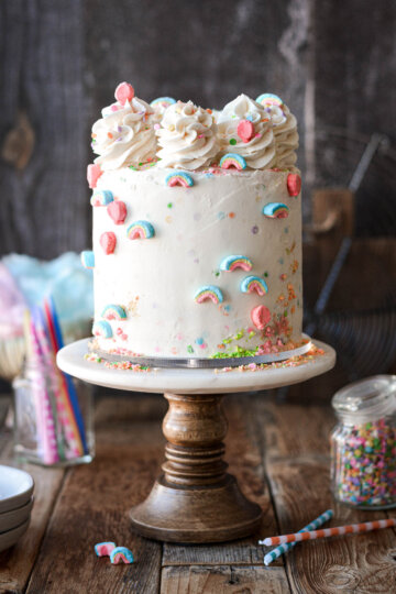 Rainbow cake decorating with Lucky Charms marshmallows.