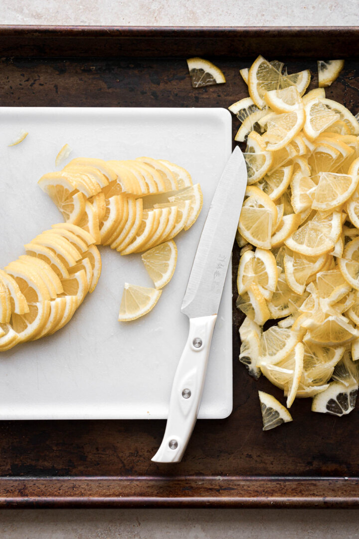 Lemons being sliced.