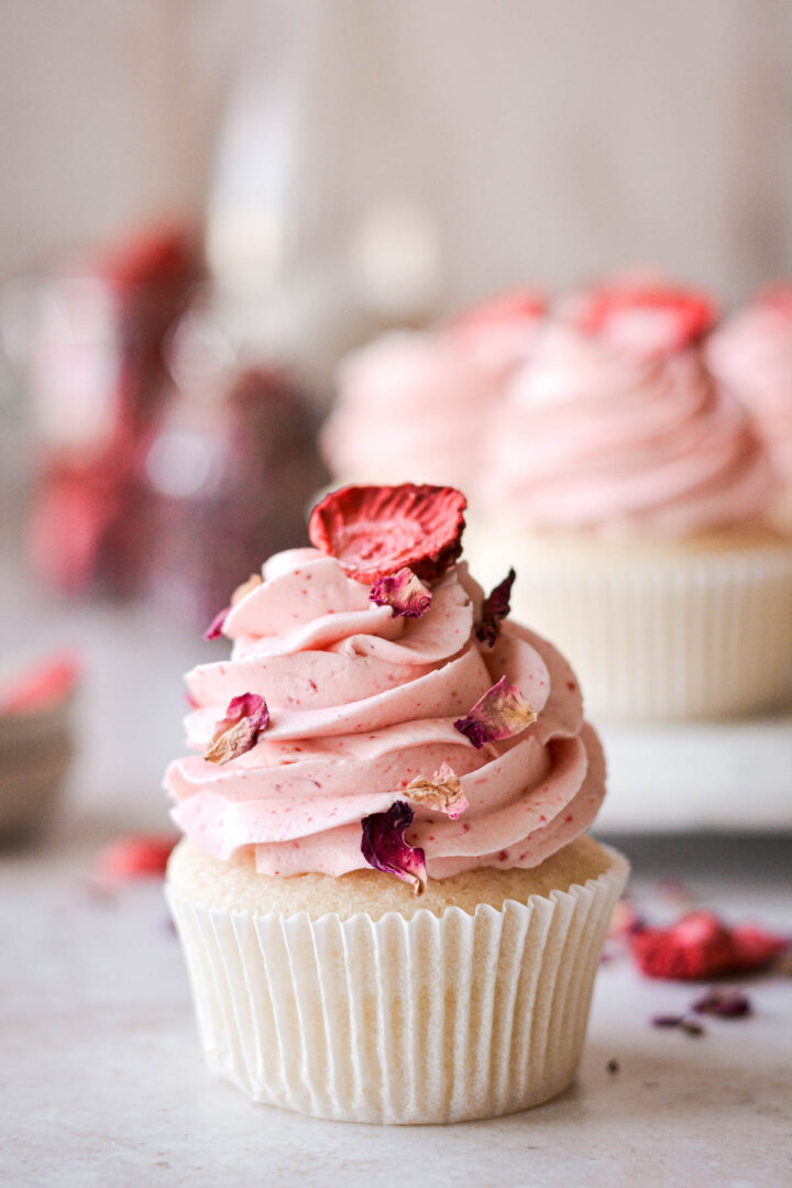 Strawberry rosé cupcake with dried edible rose petals.