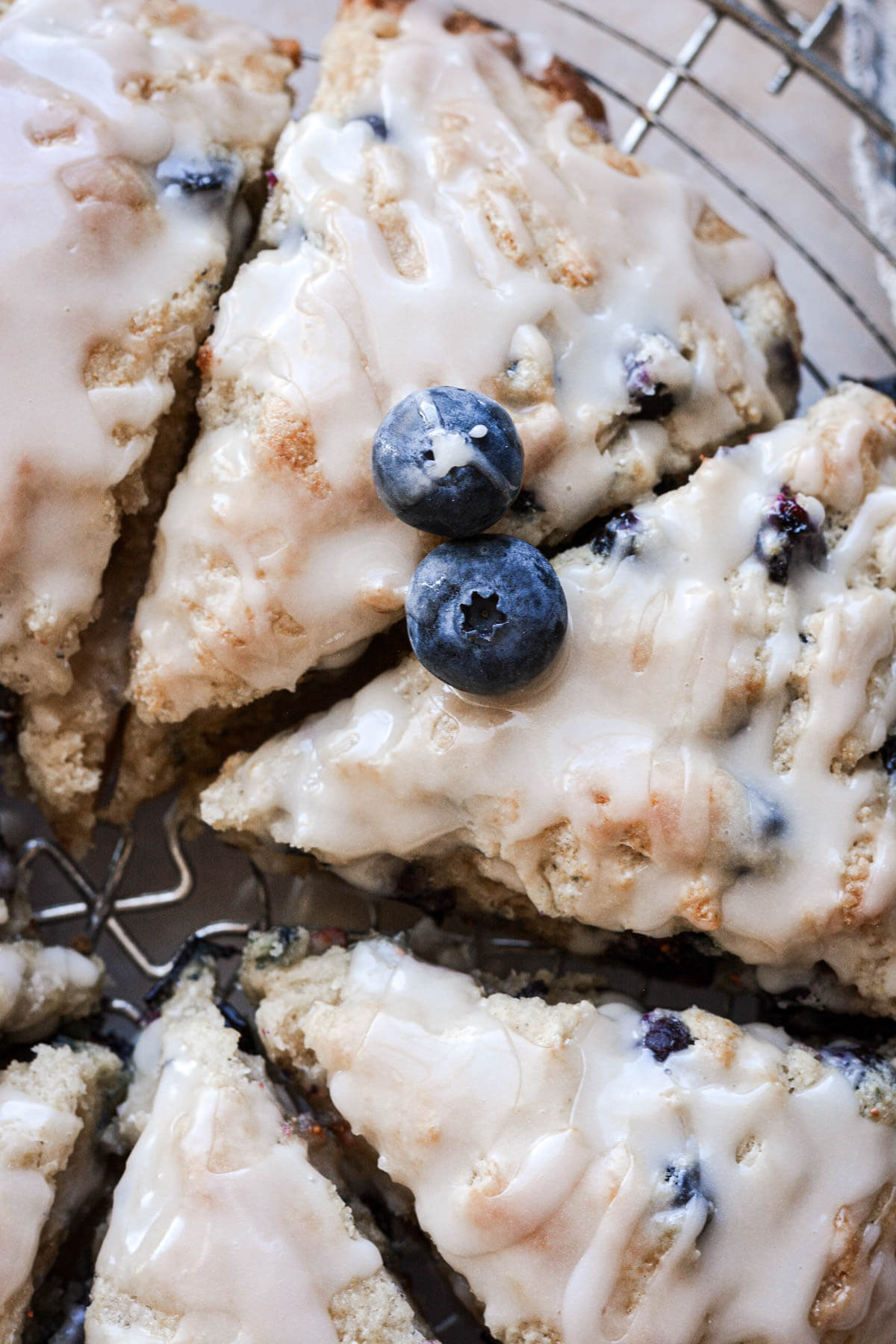 Blueberry scones with vanilla icing.