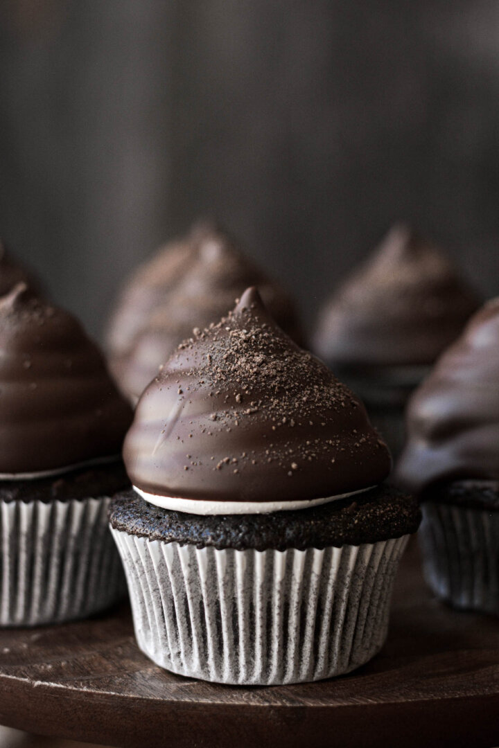 High hat cupcakes sprinkled with crushed graham crackers.