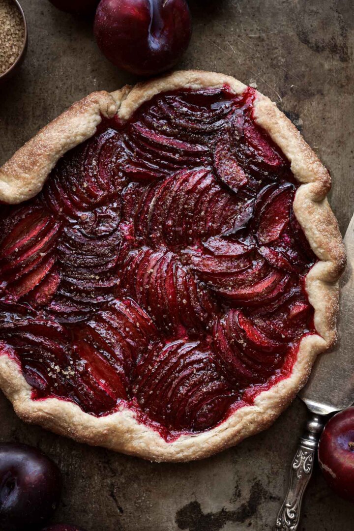 Plum galette, sprinkled with sugar.