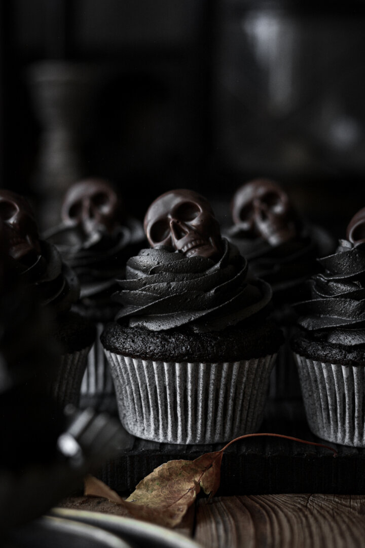 Black velvet cupcakes with chocolate skulls.
