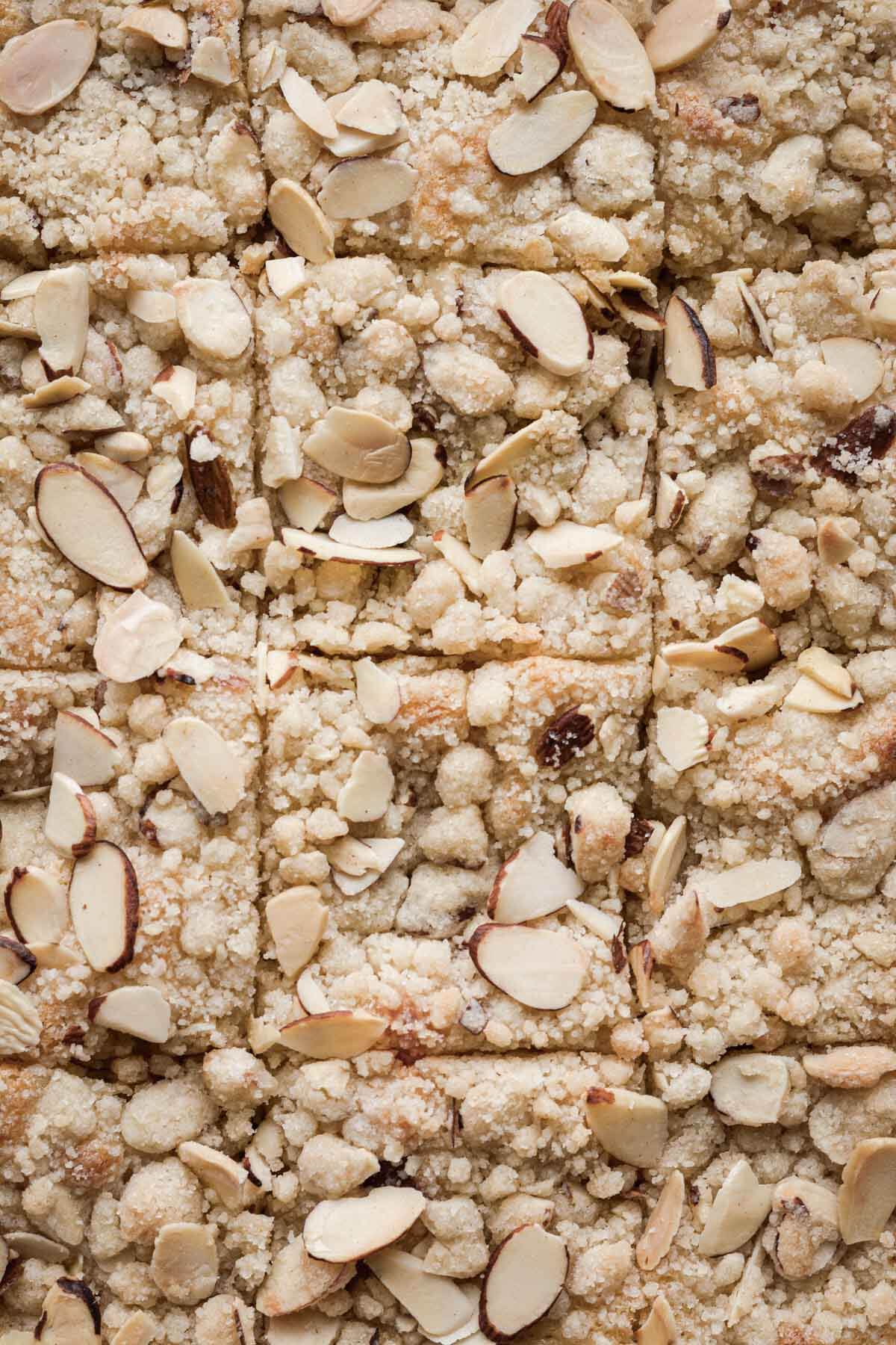 Almond coffee cake cut into squares.