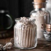 Homemade hot chocolate mix in a glass jar.