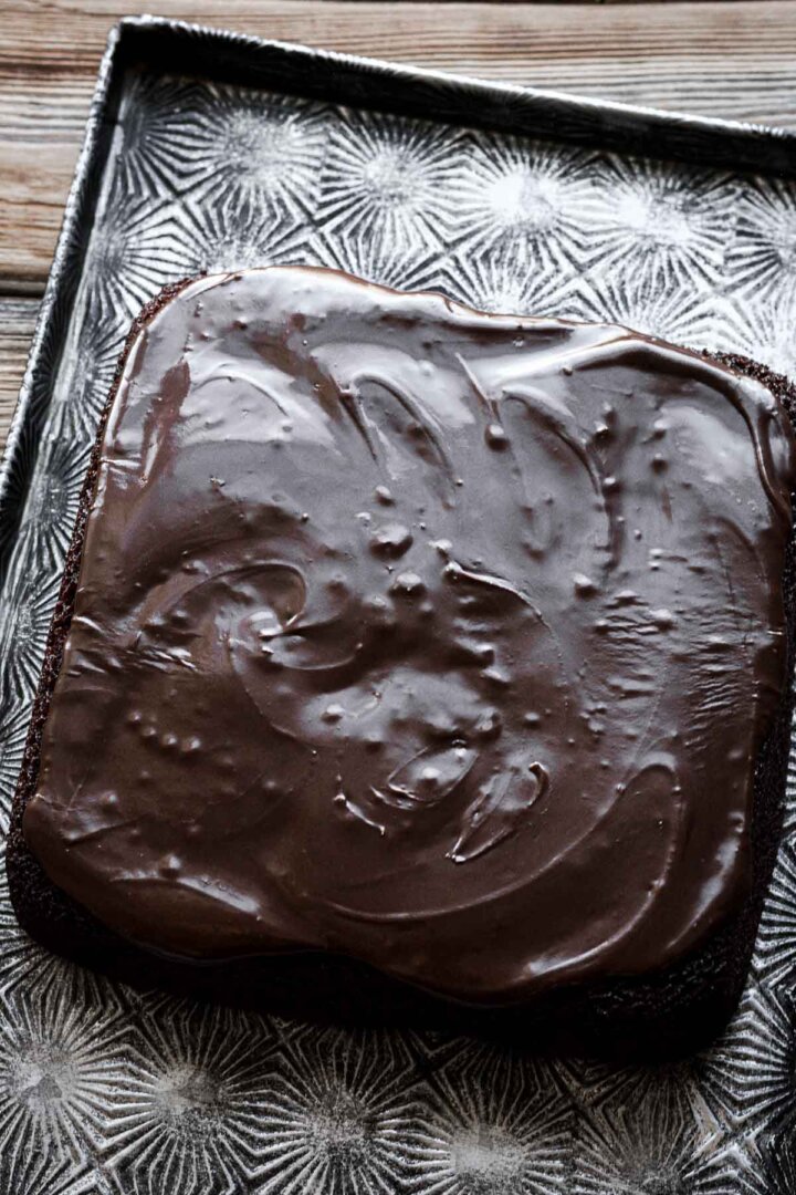 Step 6 for making a chocolate depression cake.
