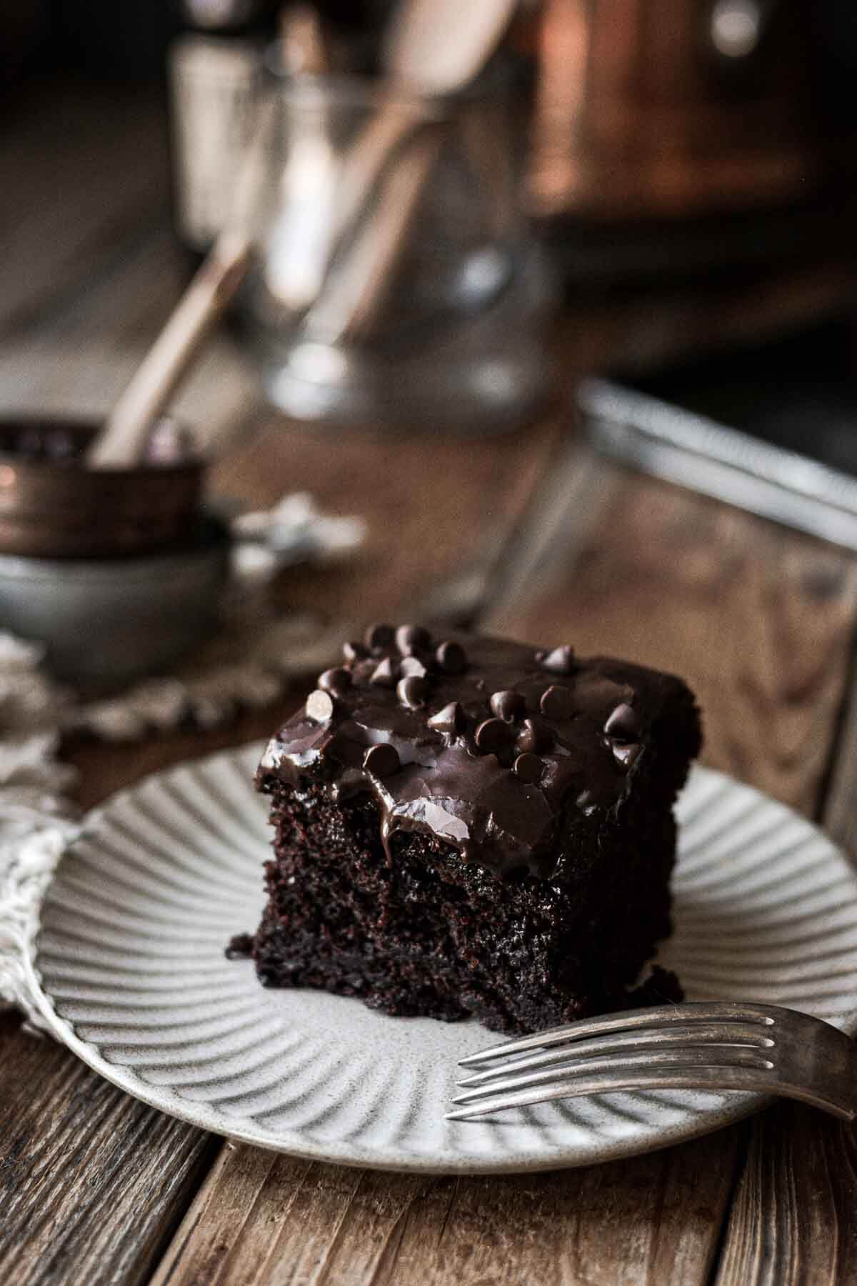 A piece of chocolate depression cake on a plate.