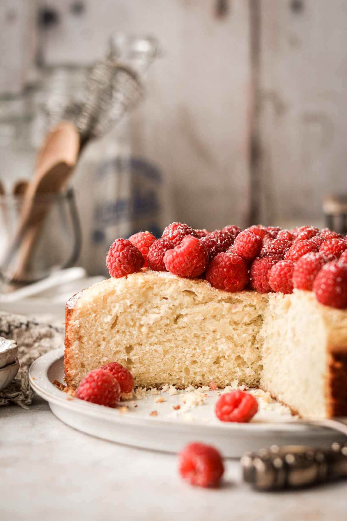 French yogurt cake with a slice cut.
